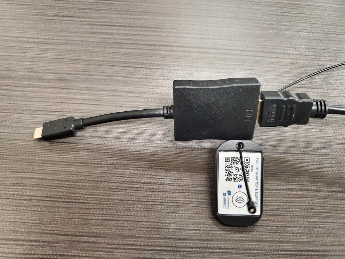 Your SLCC issued Microsoft Surface laptops will use the USB-C connection. To connect your Surface laptop, connect the adapter to the HDMI cable and plug the USB-C connection to your laptop.