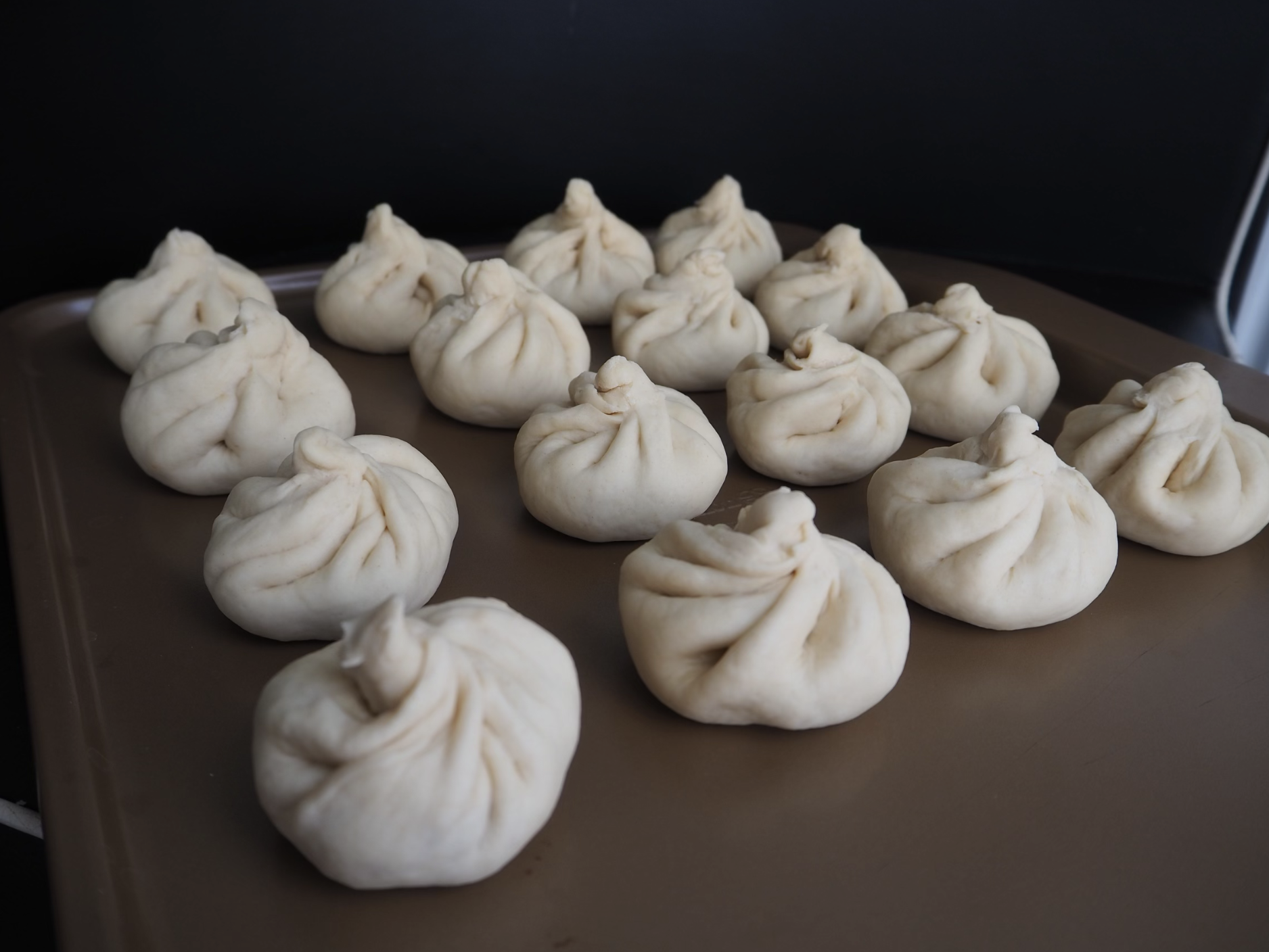 Repeat to finish making all 20 (more or less) pork buns! 🔁