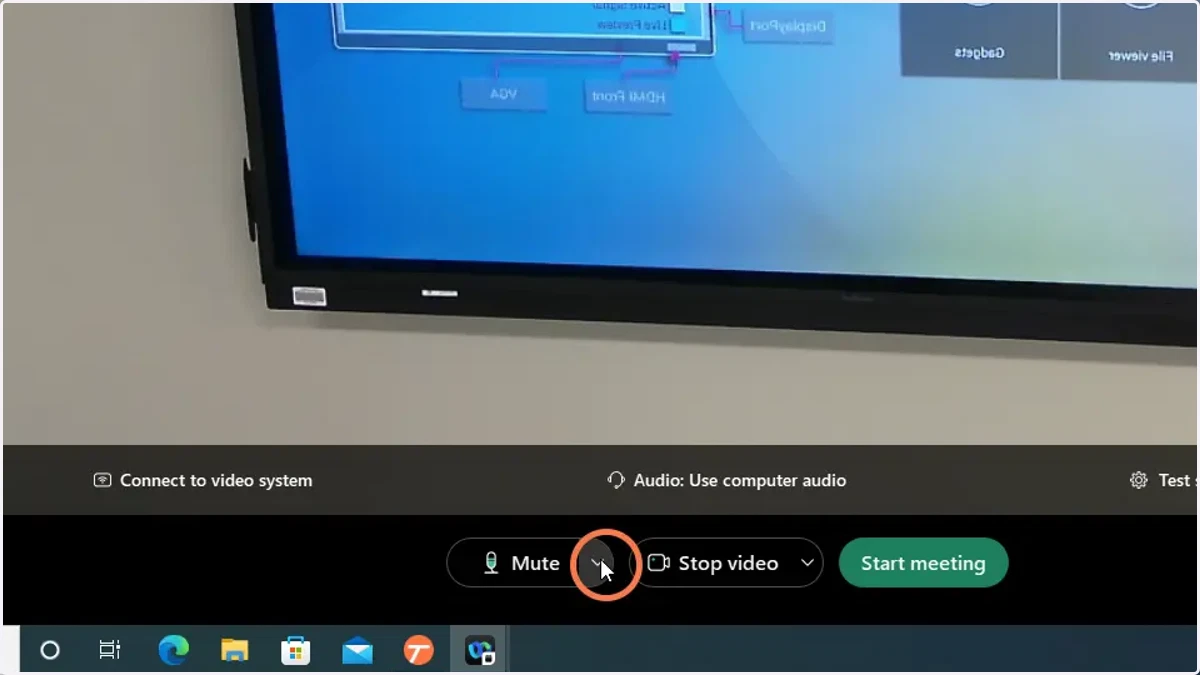 Click the down arrow on the right side of the Mute button to open the options.