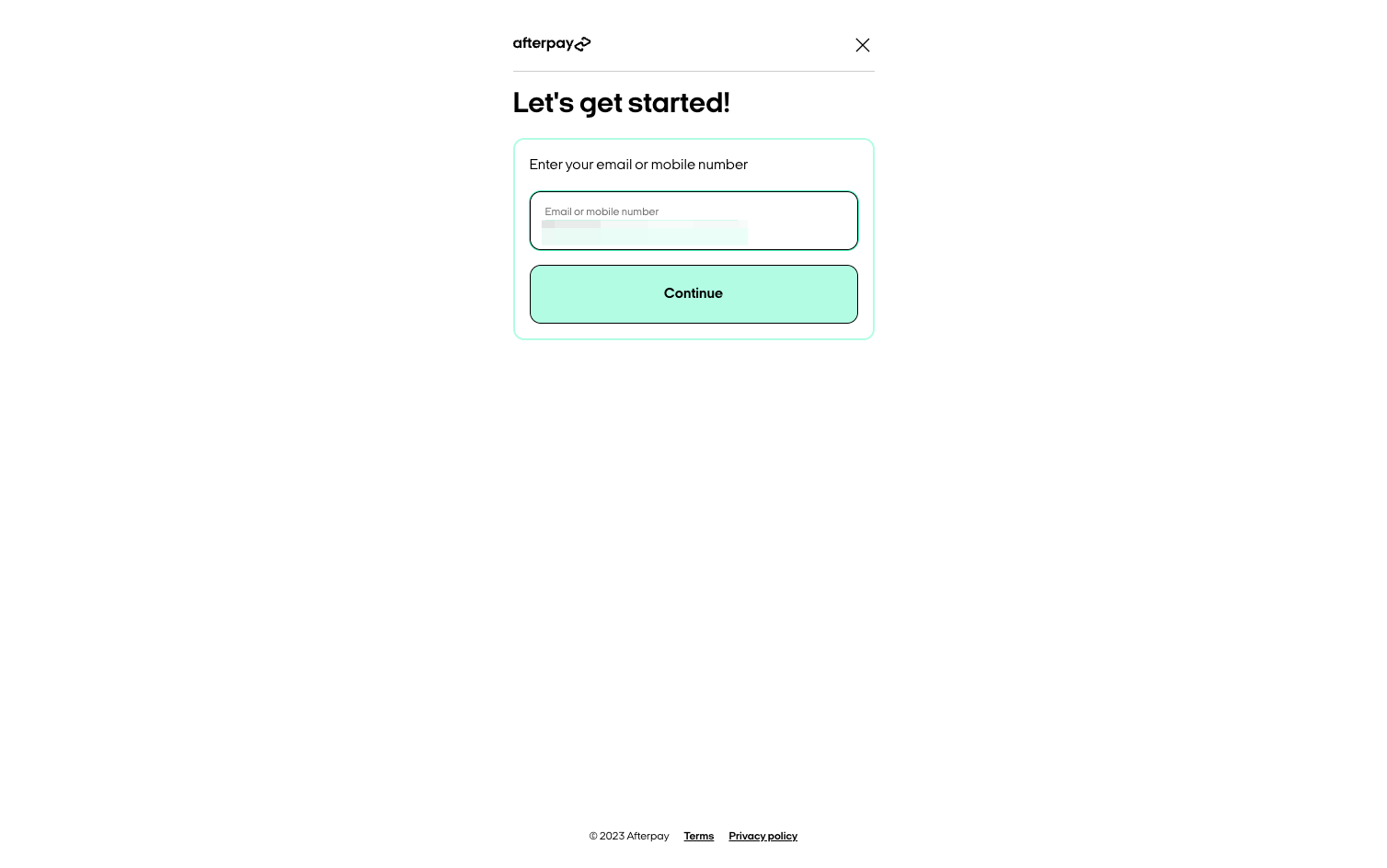 On the next page, enter the email or phone number that you want to use with your Afterpay account, and hit "Continue"