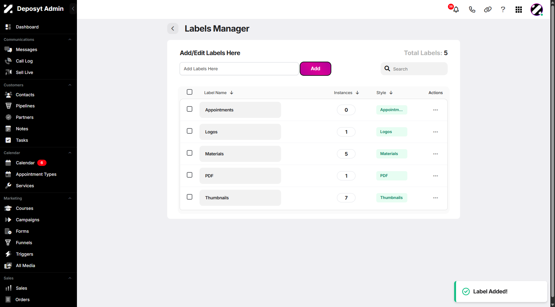 Step 9: Once saved, your newly added label will appear, along with a pop-up notification below.