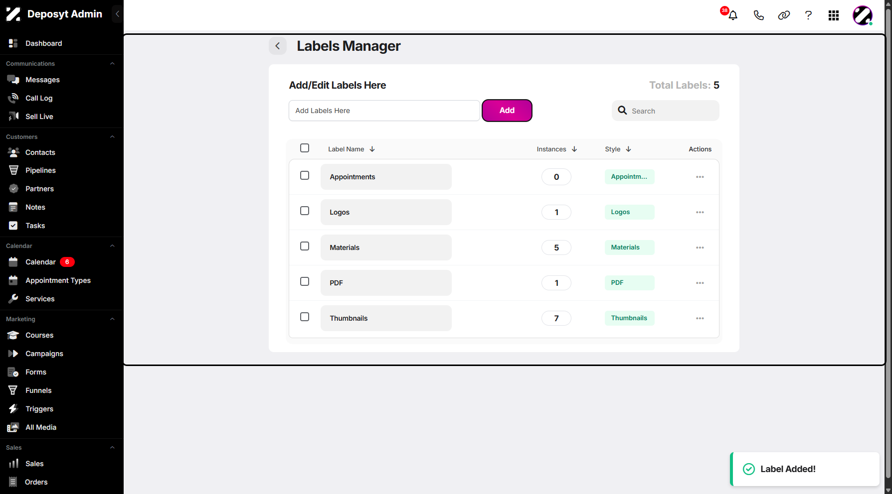 Step 9: Once saved, your newly added label will appear, along with a pop-up notification below.