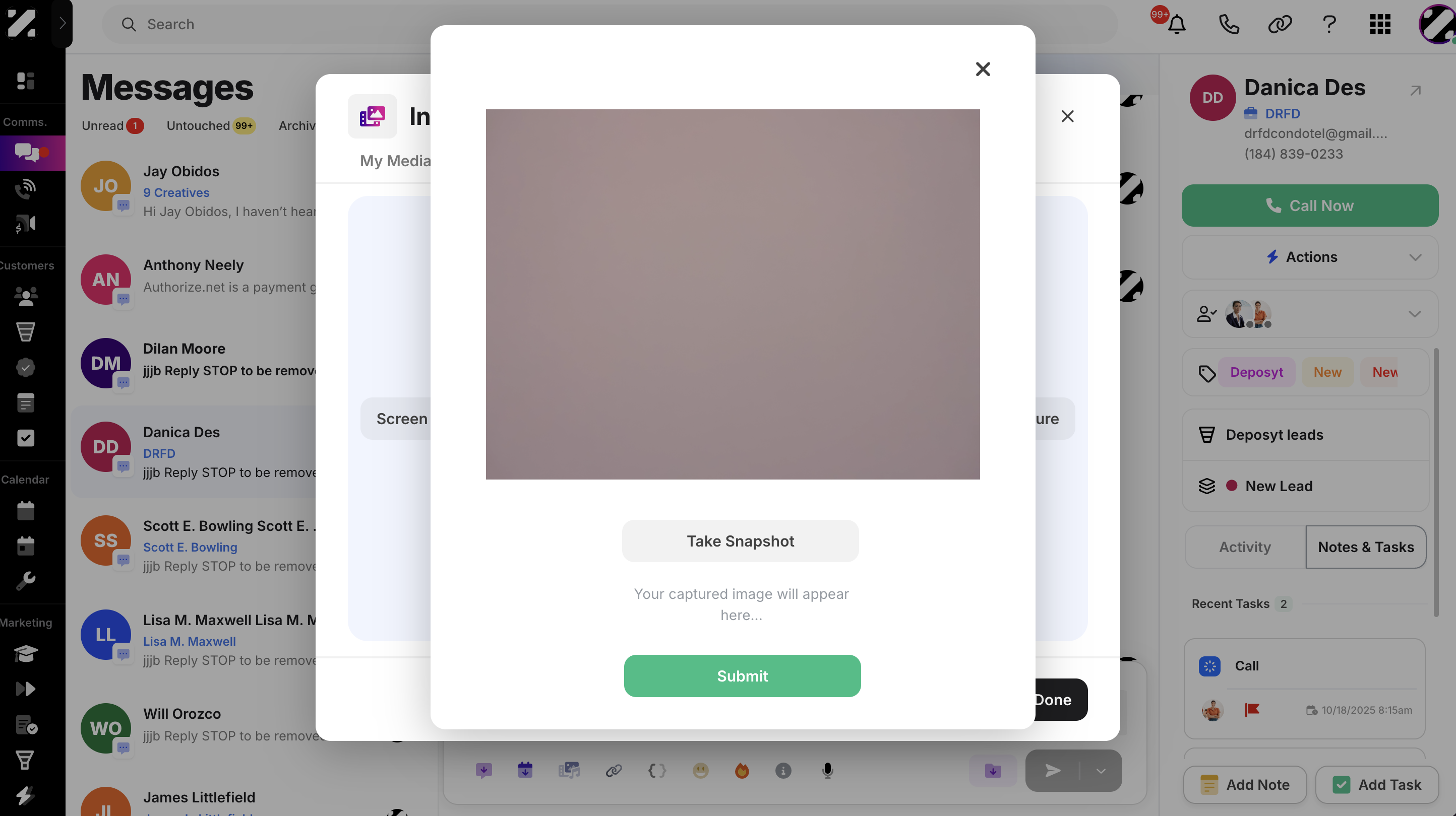 A pop-up will appear where you will see your live camera view. Take a snapshot, then click the Submit button.