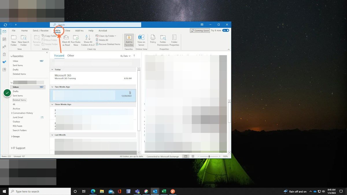 With Outlook open, click folder at the top.