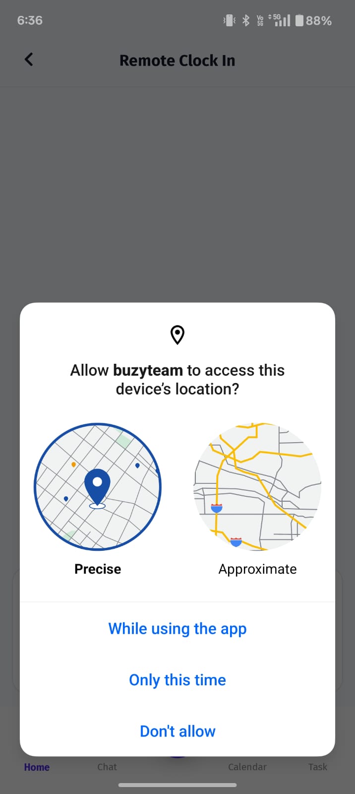 The Remote Clock In screen in the BuzyTeam mobile app appears when you attempt to clock in from a remote location. It requires location access to verify and record your attendance accurately.