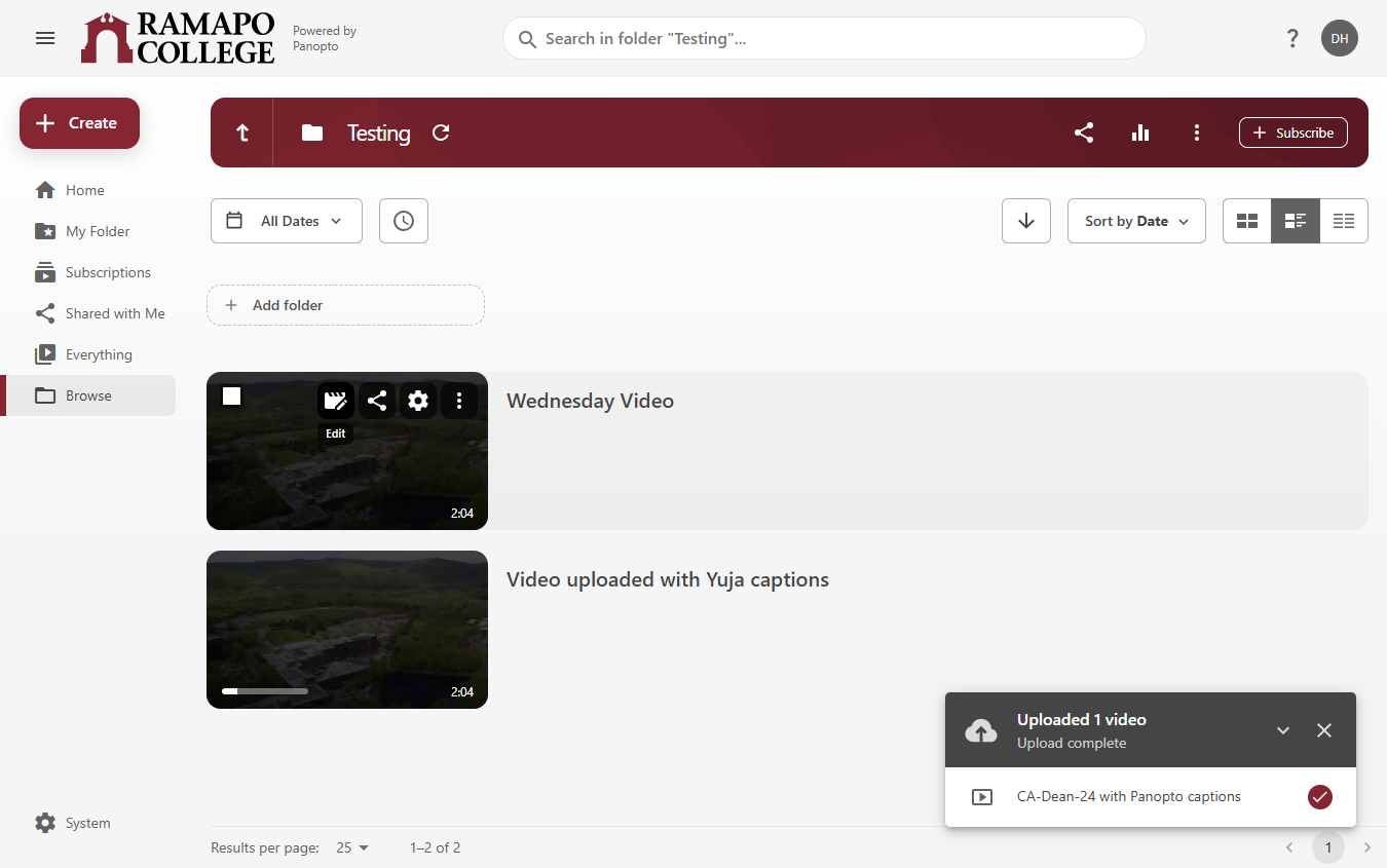 Hover over the video you want to add captions to and click the Edit button.