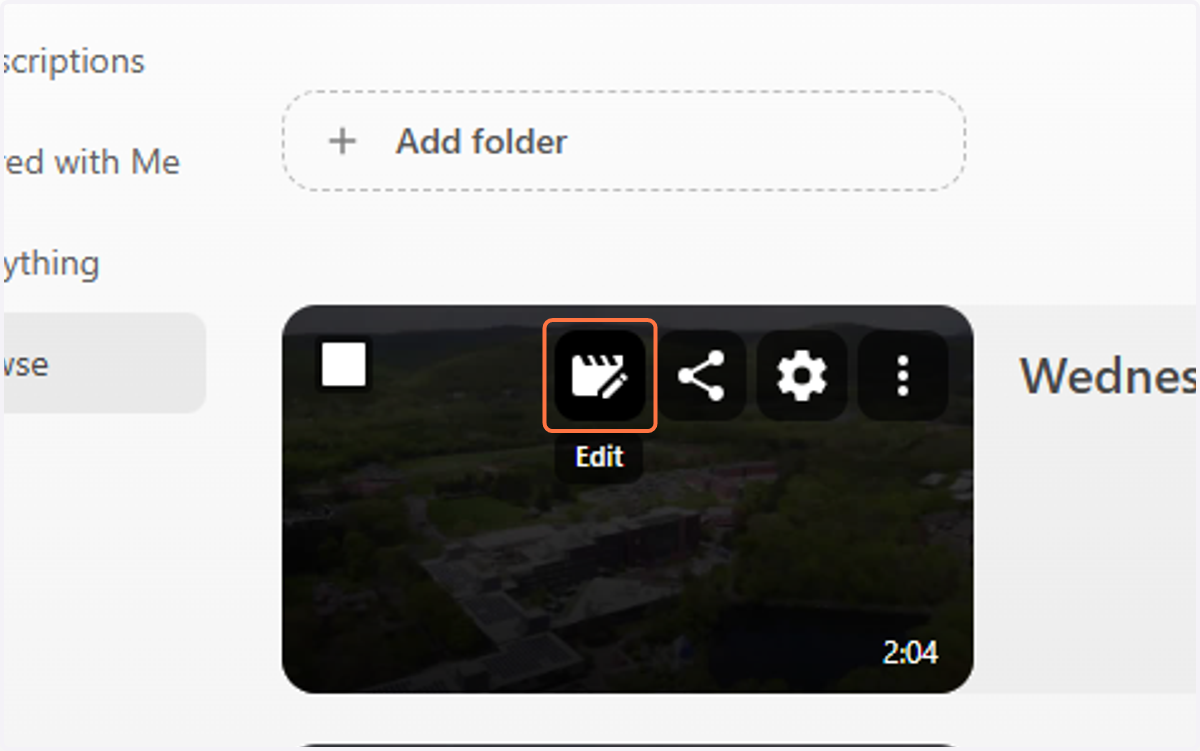 Hover over the video you want to add captions to and click the Edit button.
